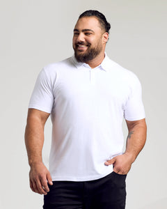 True ClassicWhite Classic Polo worn by a bearded man with casual elegance.