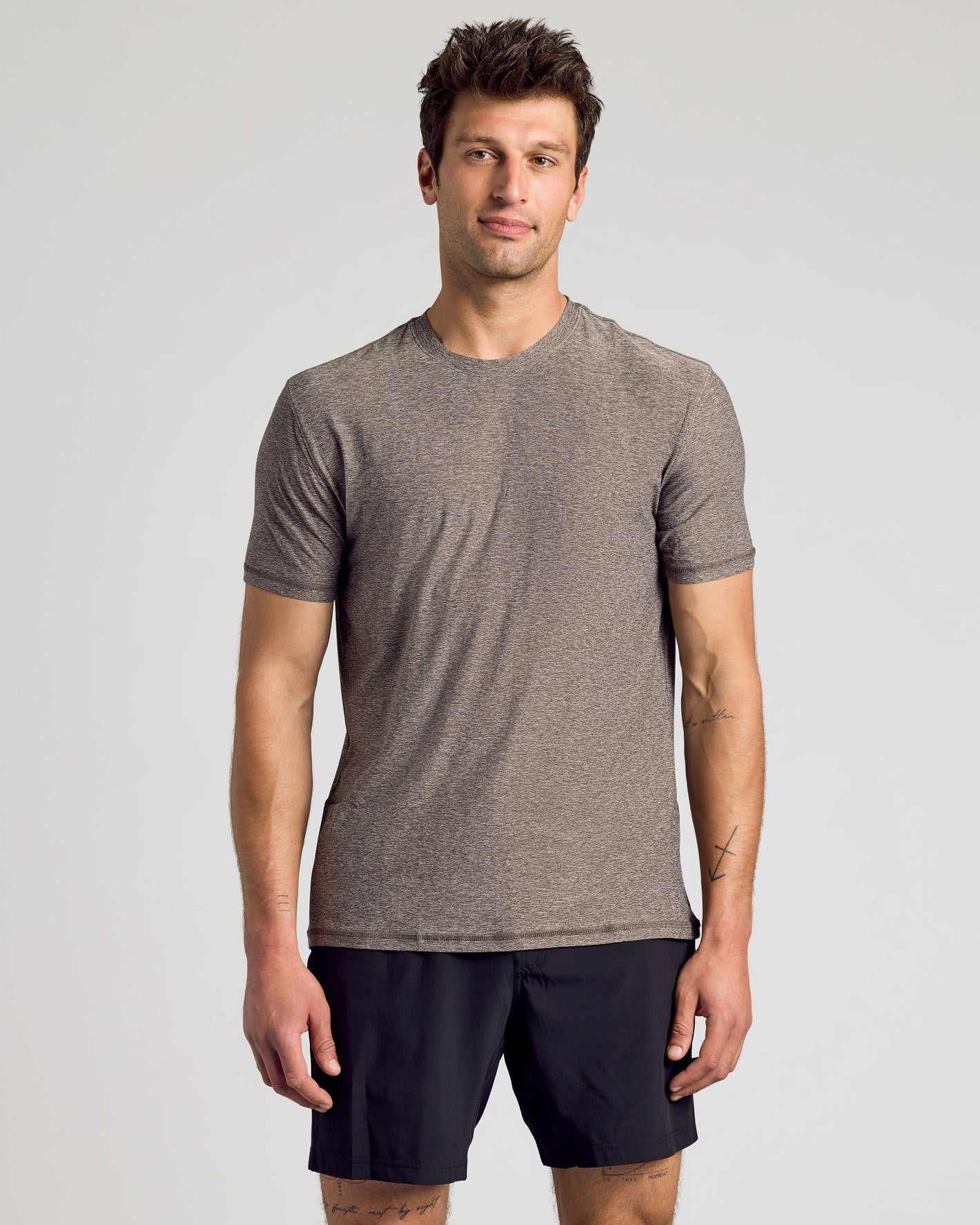 Heather Cocoa Active Crew Neck Tee on fit man in athletic shorts.