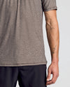 Heather Cocoa Active Crew Neck Tee on man, tattoos visible.