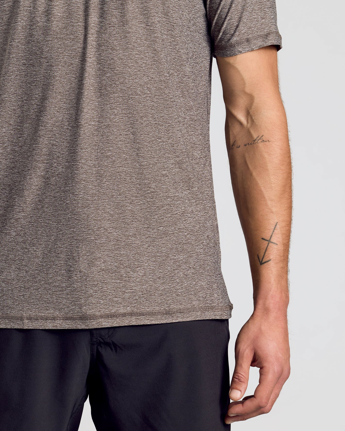 Heather Cocoa Active Crew Neck Tee on man, tattoos visible.