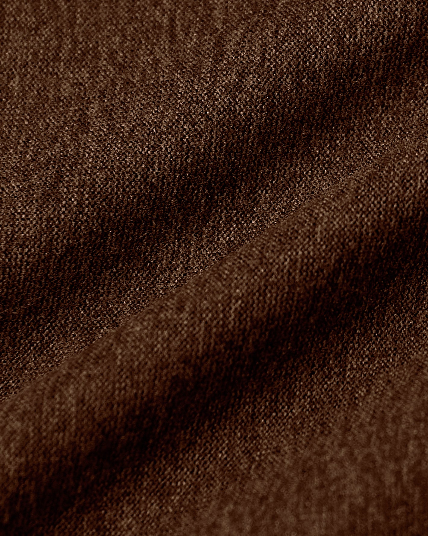 Cedar Active Tee's brown woven texture, showcasing fine threads and gentle folds.