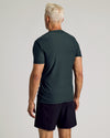 Dark Heather Forest Active Short Sleeve Crew Neck Tee on male model's back view.