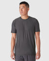 Dark Heather Tempest Active Crew Neck Tee on model, showcases athletic fit.