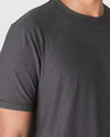 Dark Heather Tempest Active Crew Neck Tee on upper torso, showcasing fabric texture.