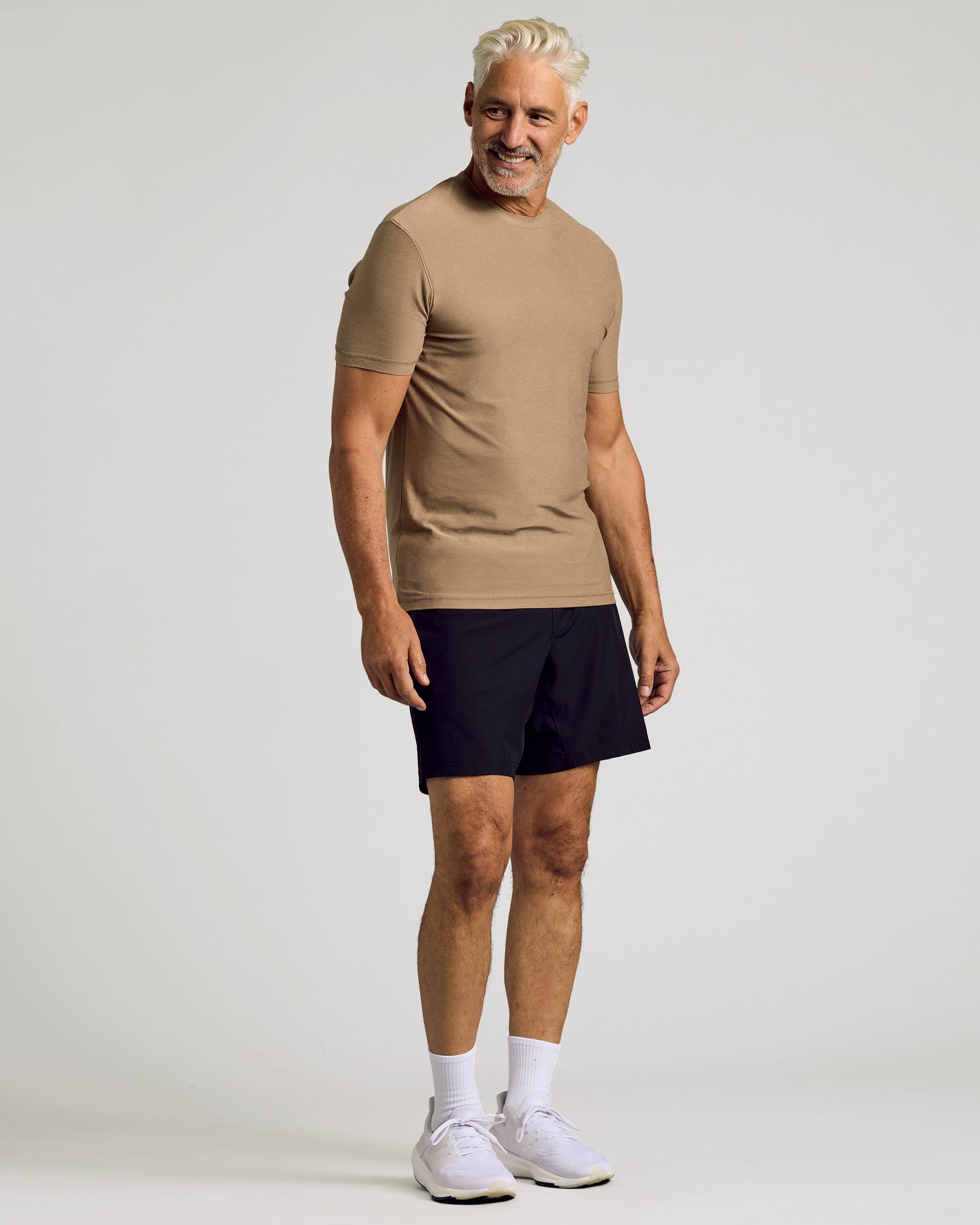 Driftwood Active Crew Neck Tee on man in athletic shorts.