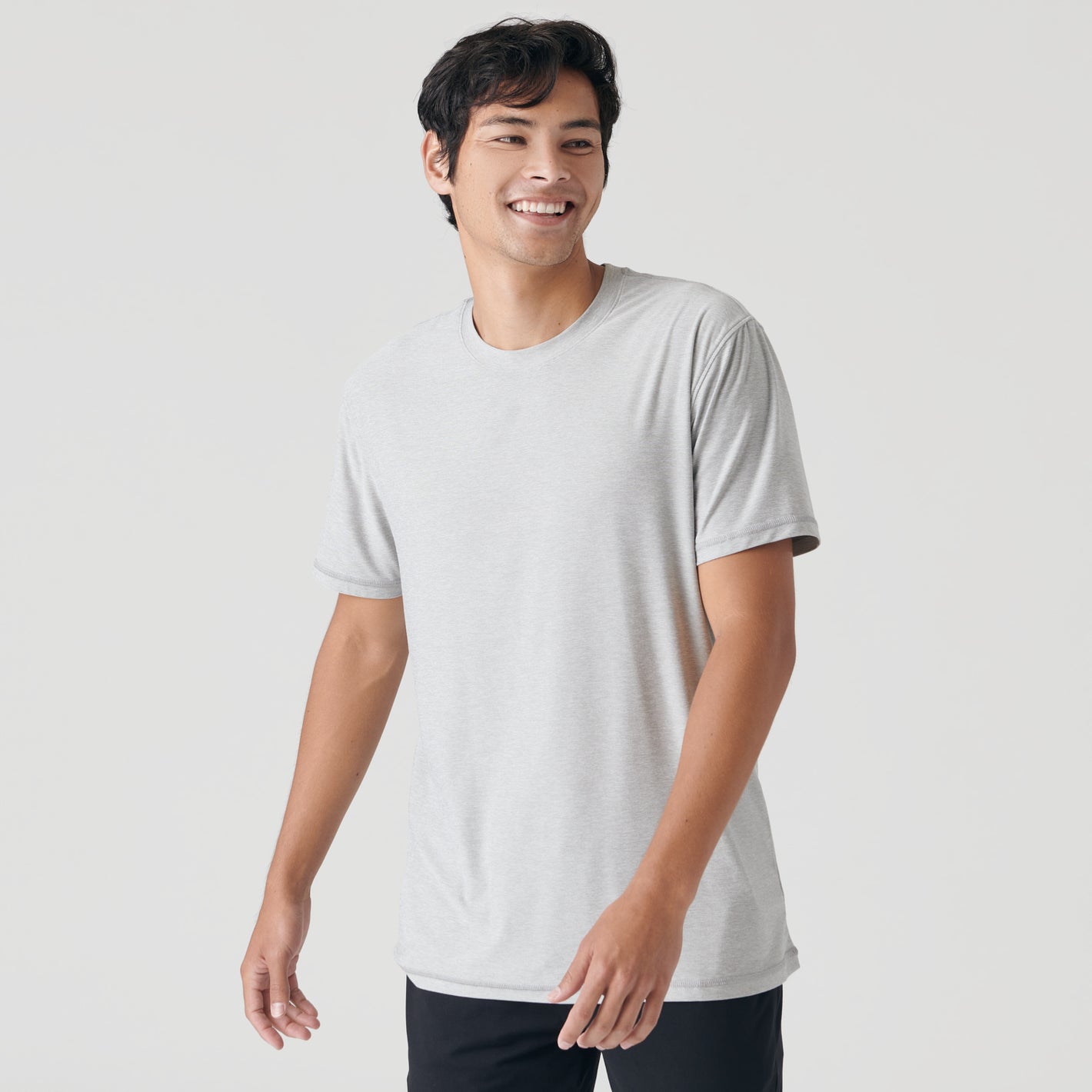 Heather Active and Classic Crew Neck Tee 6-Pack on a smiling man.
