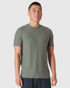 Heather Forest Short Sleeve Active Crew Neck on model, neutral stance.