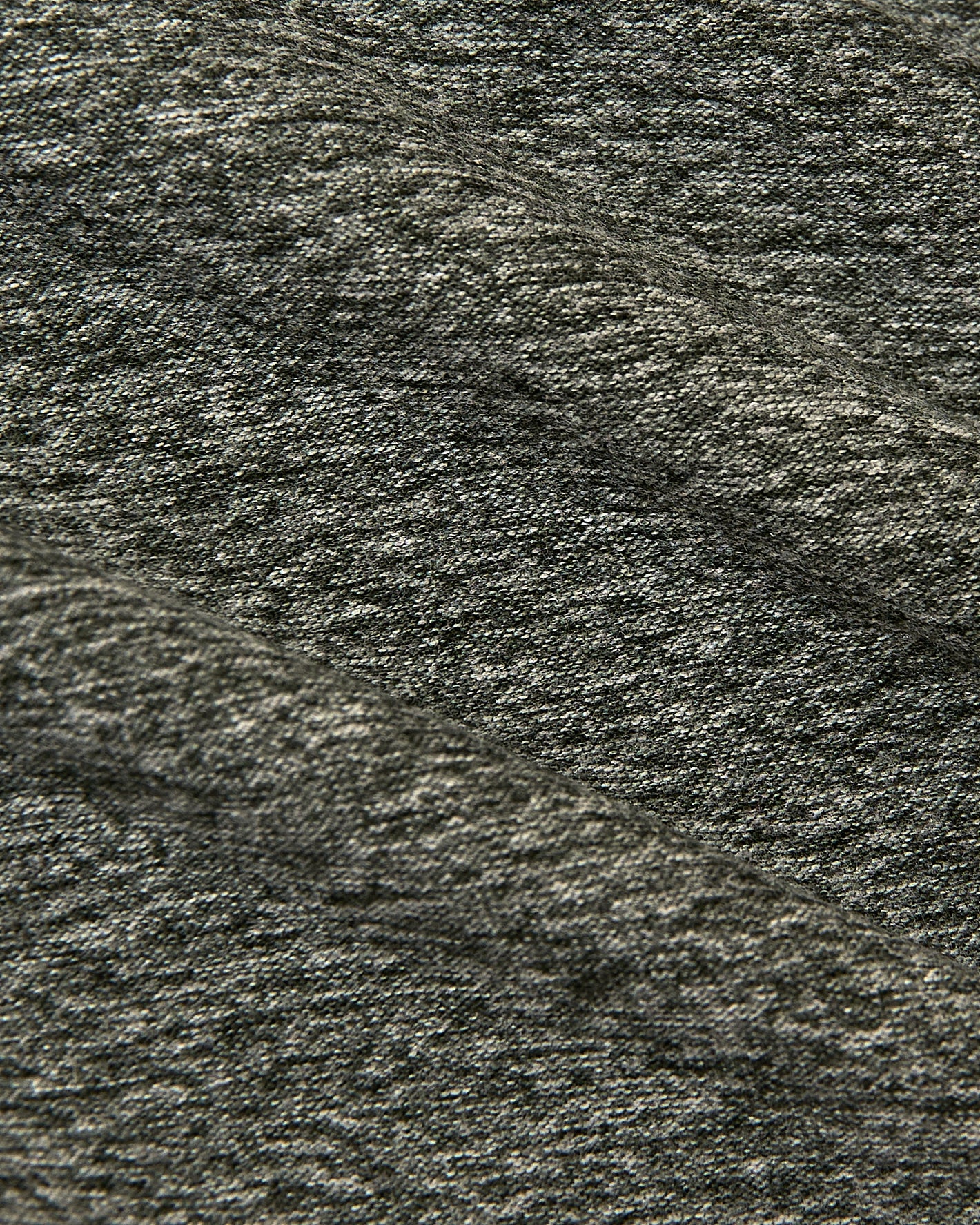 Heather Forest Short Sleeve Active Crew Neck in soft grey knit fabric folds.