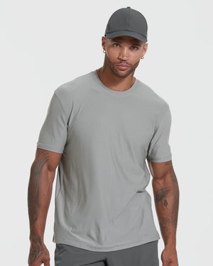 Man wearing an Iron Gray Active Crew Neck Tee and matching gray cap, showcasing a comfortable fit in a men's basic style.