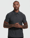 Man wearing True Classic Men’s Active Short Sleeve Polo, showcasing its modern fit.