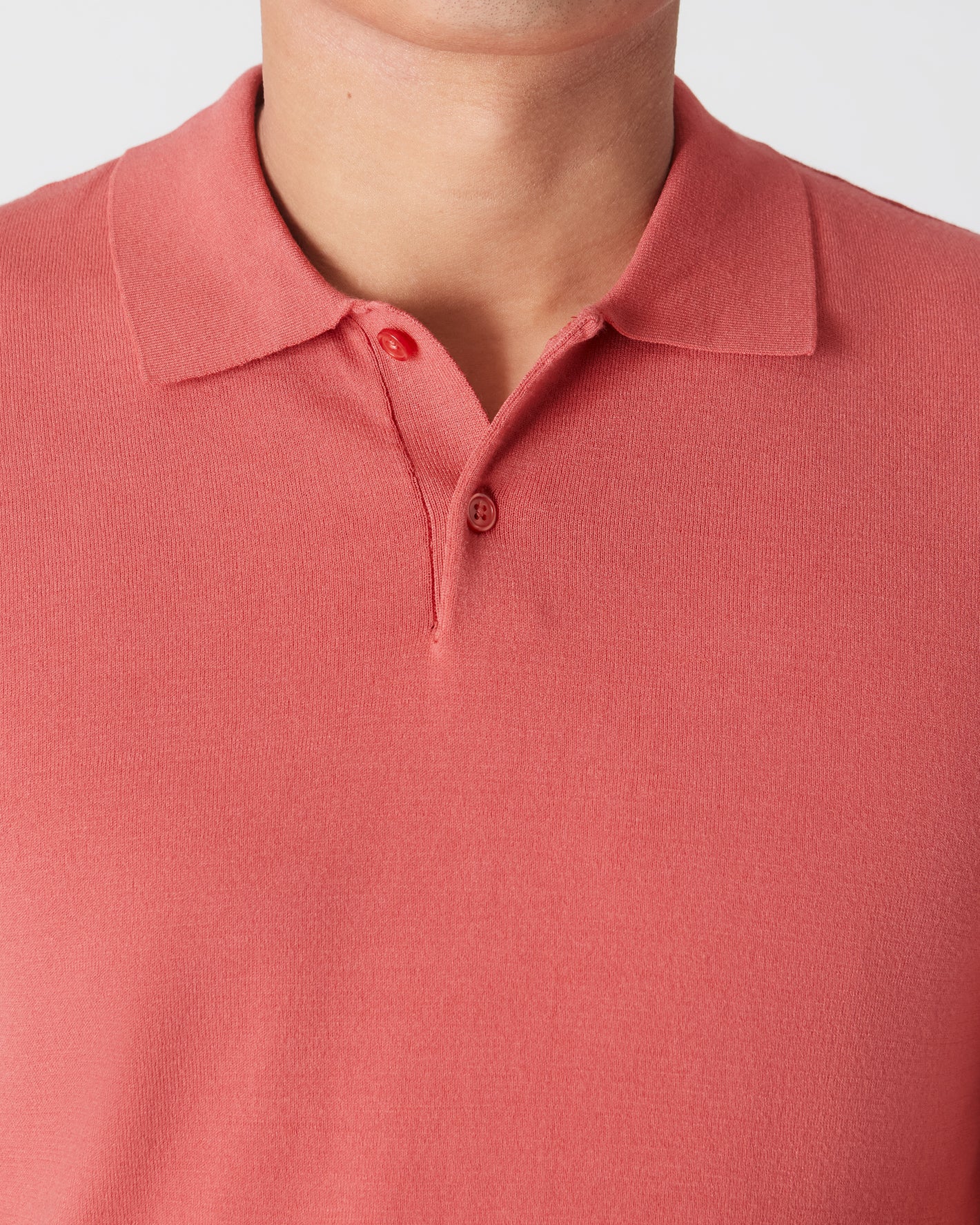 Garnet Short Sleeve Sweater Polo with collar and two-button placket.