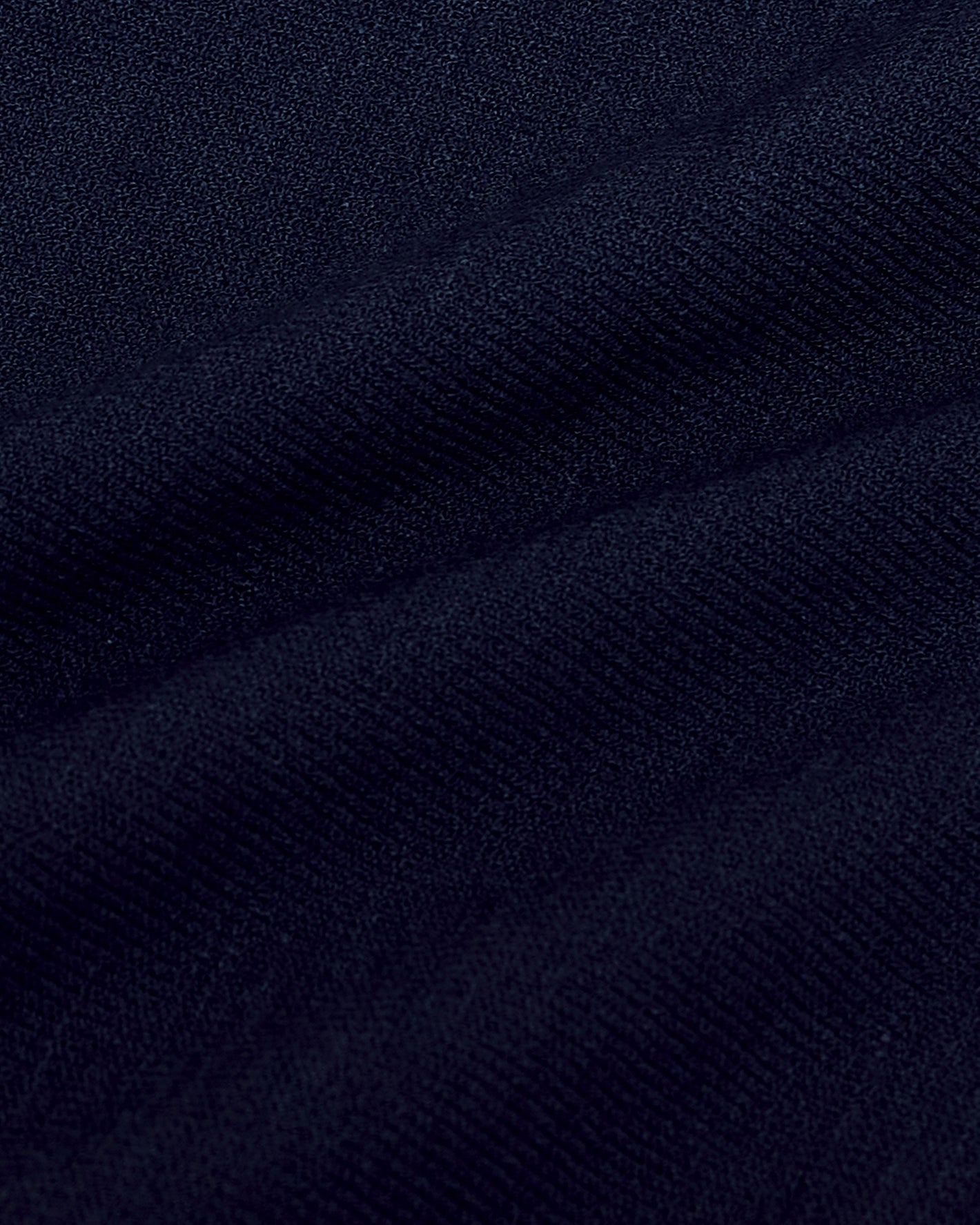 Navy Short Sleeve Sweater Polo with fine knit texture folds.