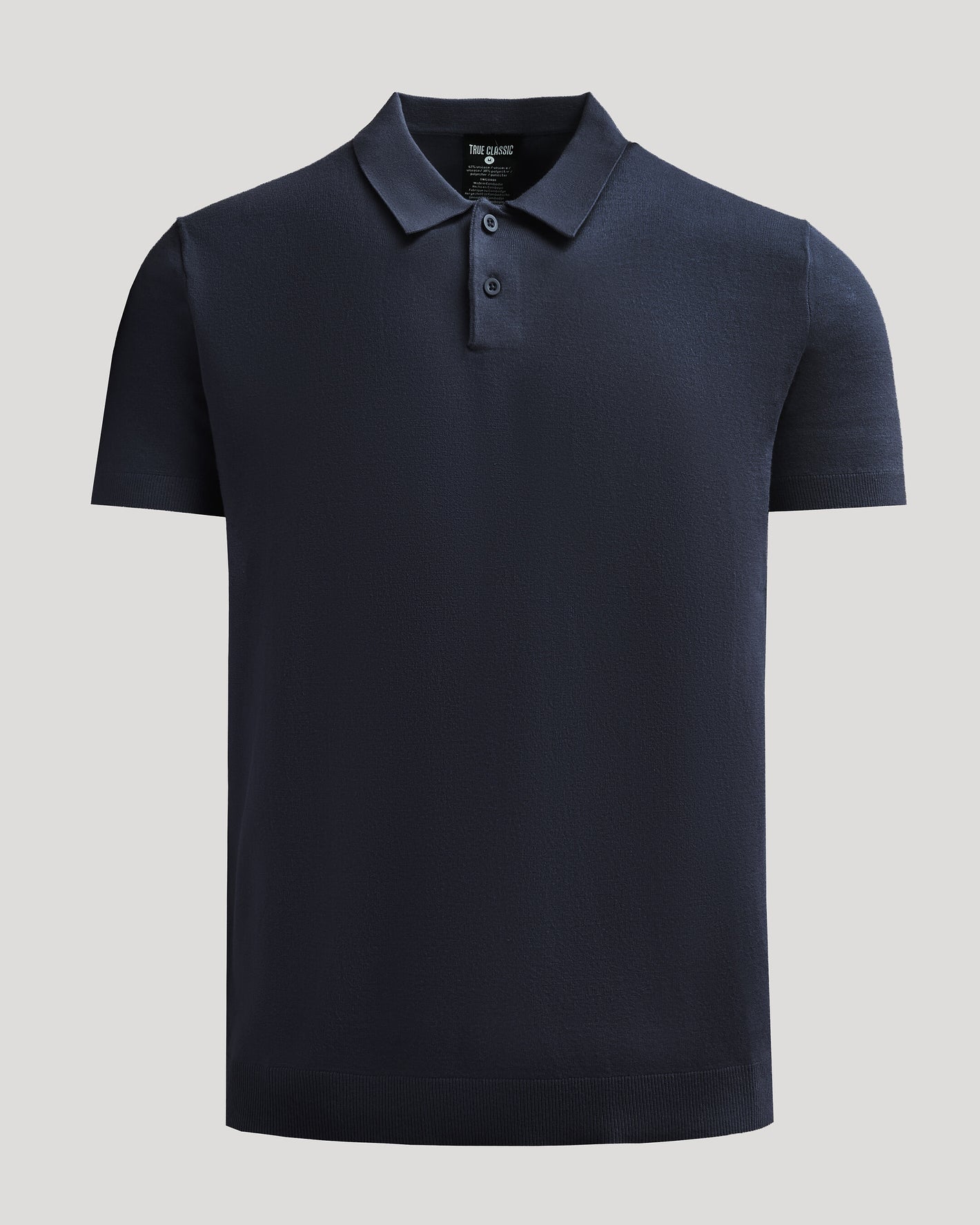 Navy Dressy Polo with classic collar and ribbed cuffs.