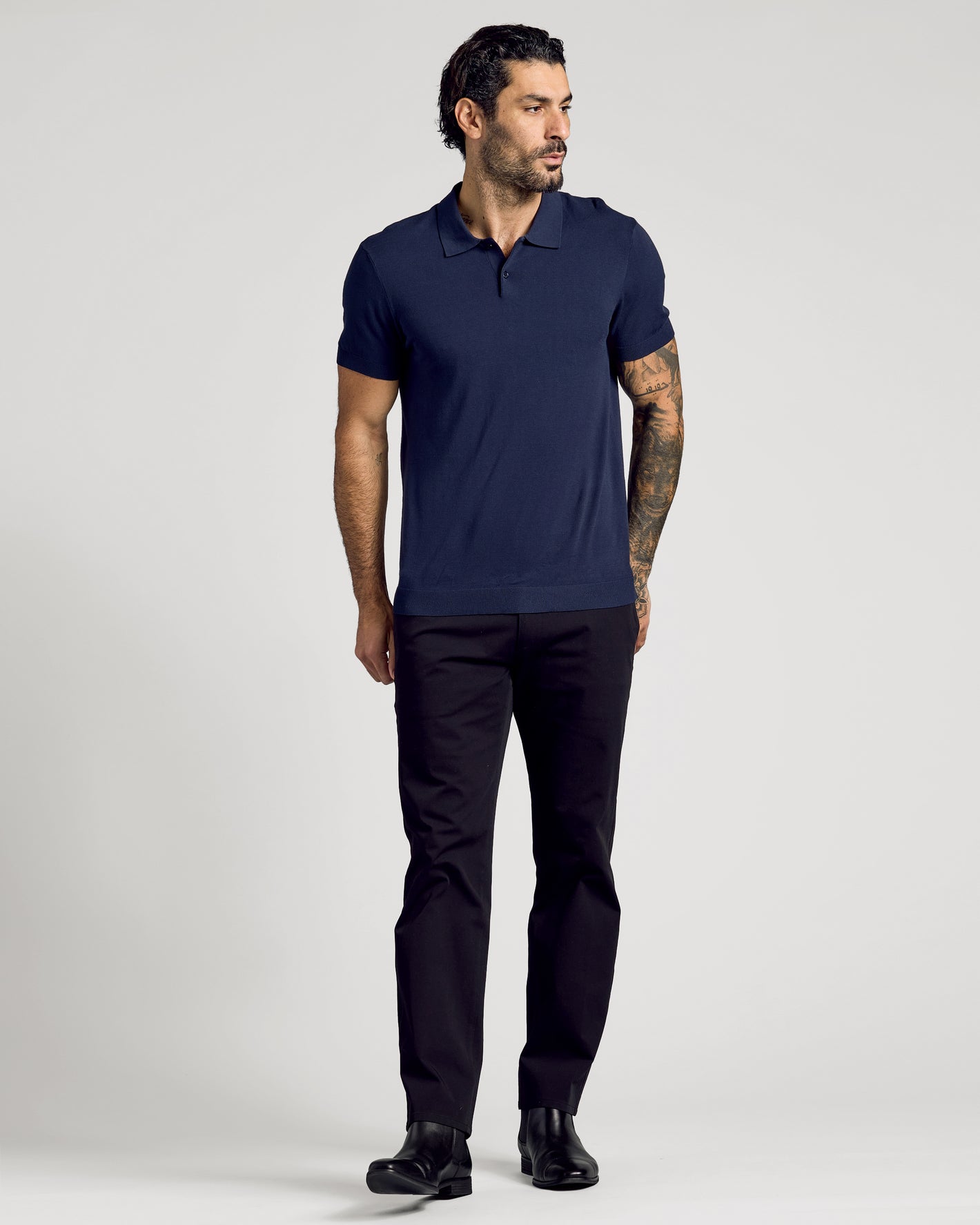 Navy Short Sleeve Sweater Polo on model with tattoo sleeve.