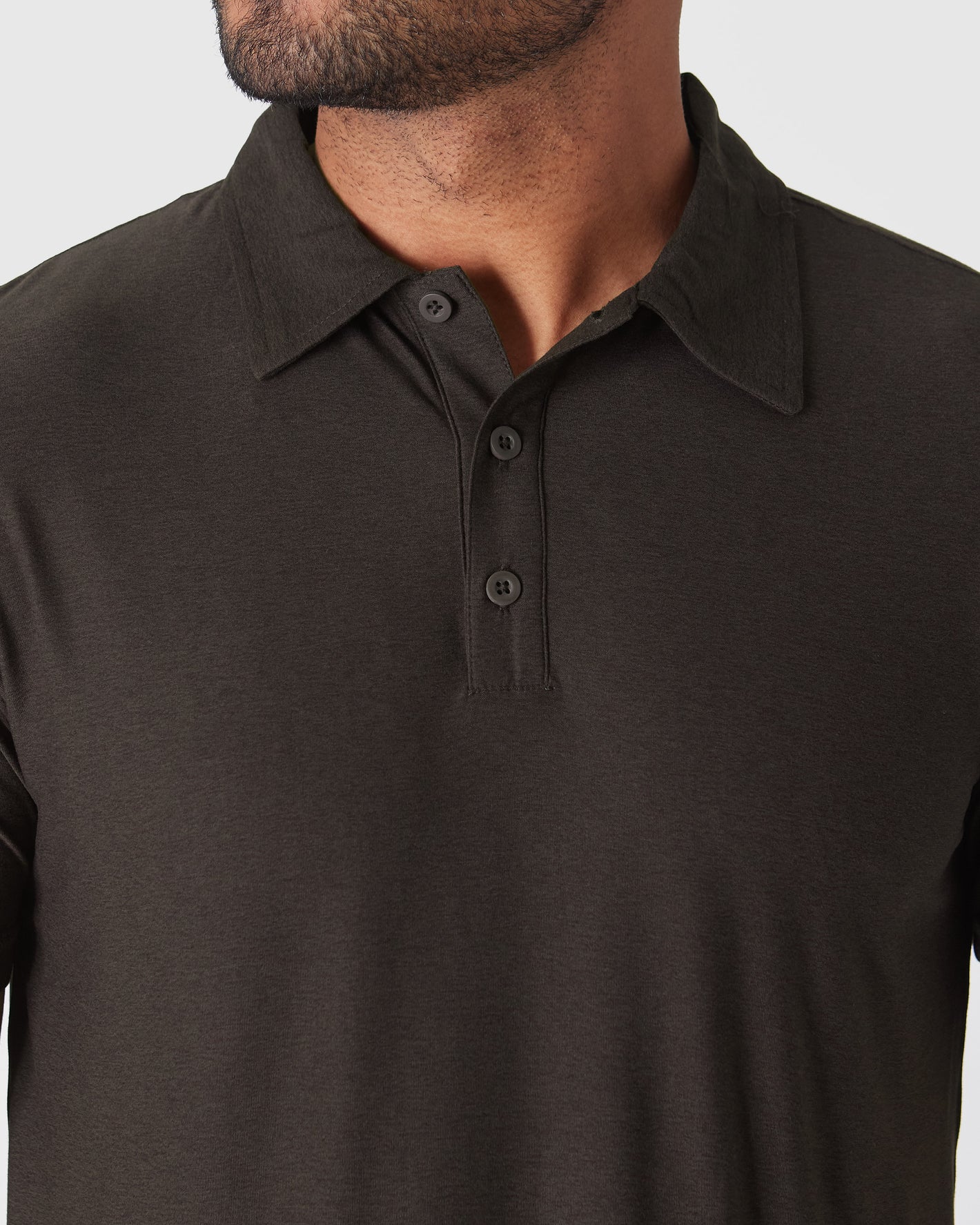 Dark Heather Cocoa Active Polo 2.0 with classic collar and button placket.