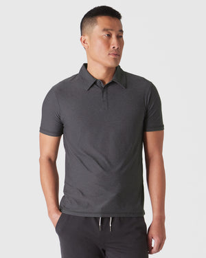 Dark Heather Tempest Active Polo 2.0 on male model, stylish fit.