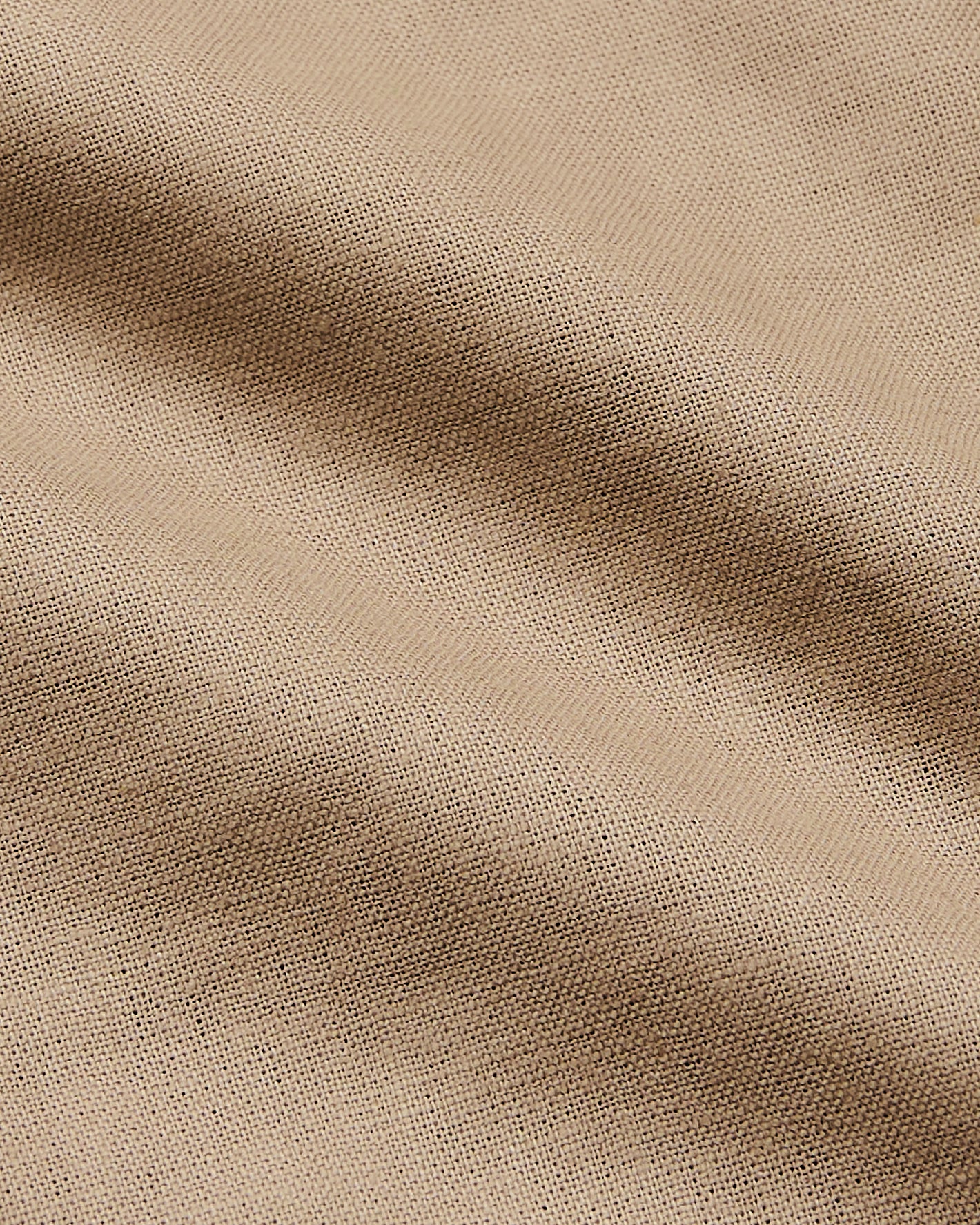 Dusty Taupe Short Sleeve Linen Shirt close-up, highlighting its textured weave.