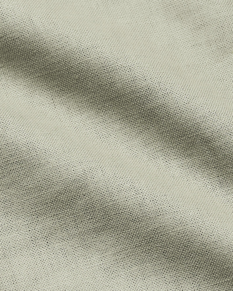Mossy Oak Short Sleeve Linen Shirt fabric close-up, showcasing woven texture.