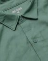 Moss Short Sleeve Linen Shirt collar and placket close-up.