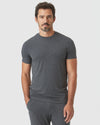 Man in Charcoal Heather Gray Short Sleeve Loungewear Tee, relaxed pose.