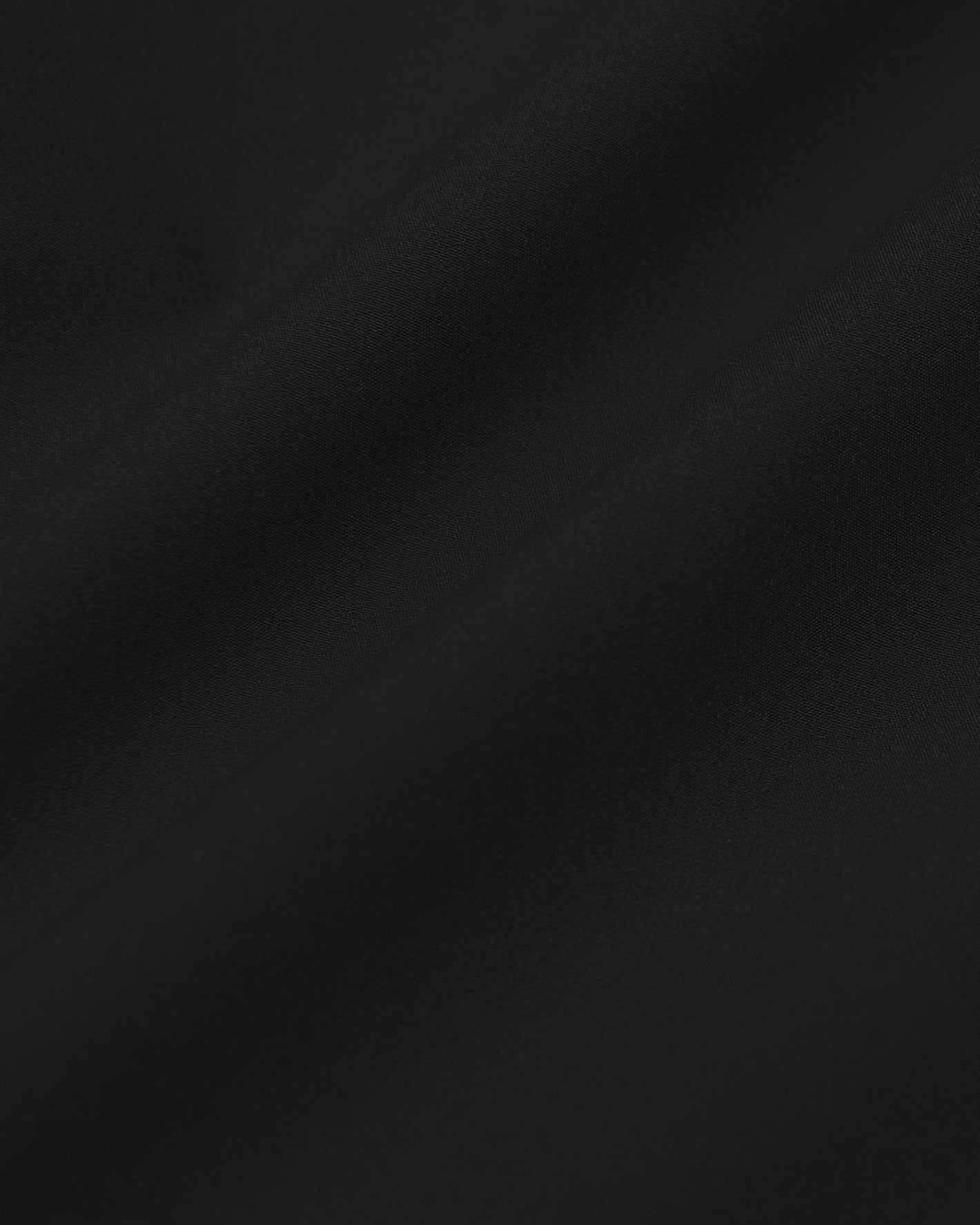 Black & Carbon Commuter Short Sleeve Shirt 2-Pack, smooth black fabric texture.