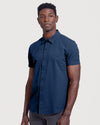 Man wearing Timeless Short Sleeve Commuter Shirt in navy.
