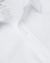 White Short Sleeve Commuter Shirt close-up, highlighting collar and button detail.