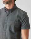 Man wearing Black Wash Short Sleeve Stretch Chambray Shirt with chest pocket.
