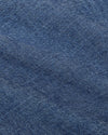 Light Indigo Wash Short Sleeve Stretch Chambray Shirt, close-up of woven denim fabric.