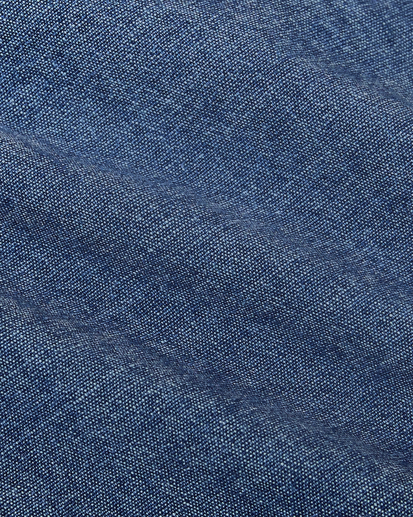 Light Indigo Wash Short Sleeve Stretch Chambray Shirt, close-up of woven denim fabric.