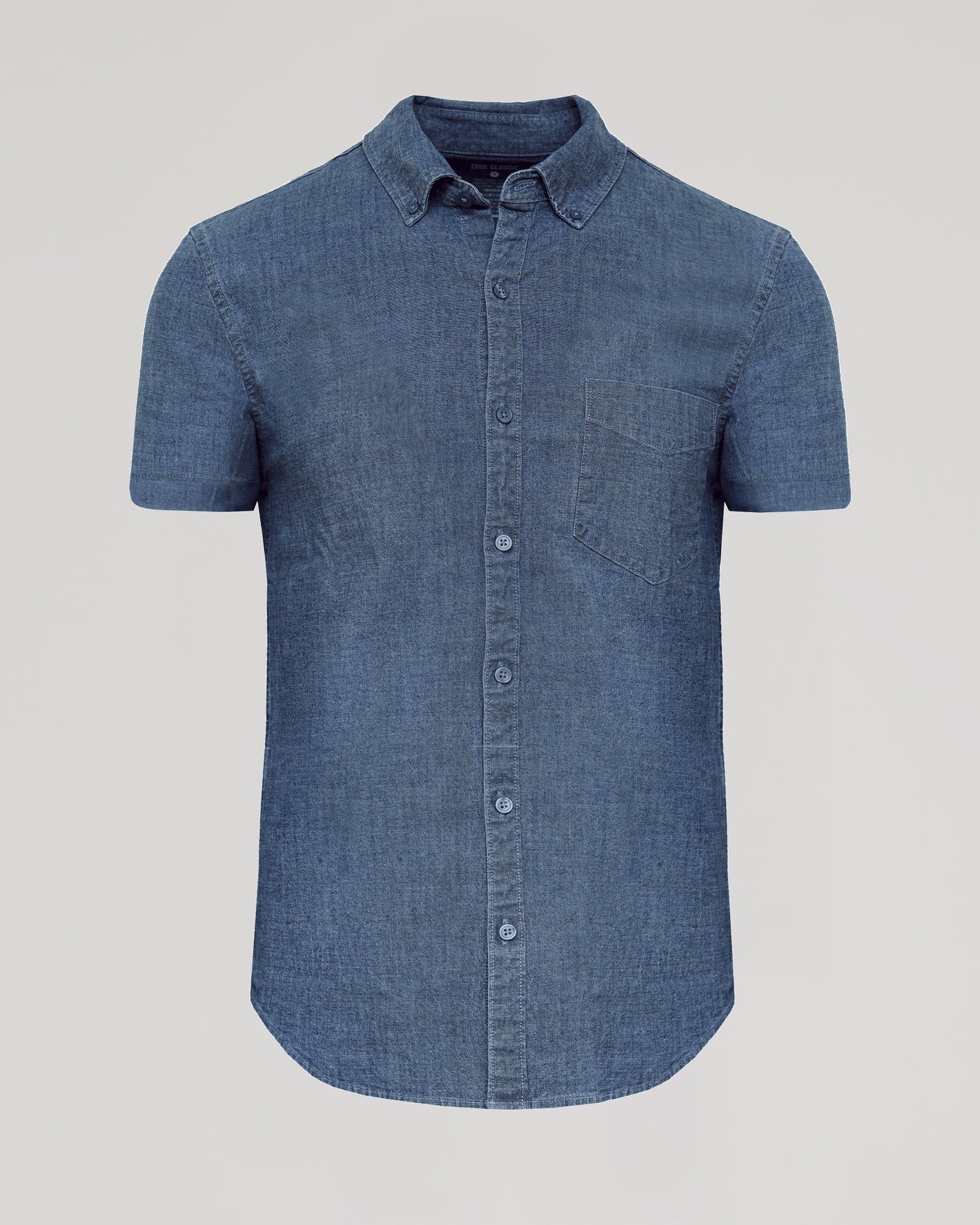 Medium Indigo Wash Short Sleeve Stretch Chambray Shirt with button front and chest pocket.