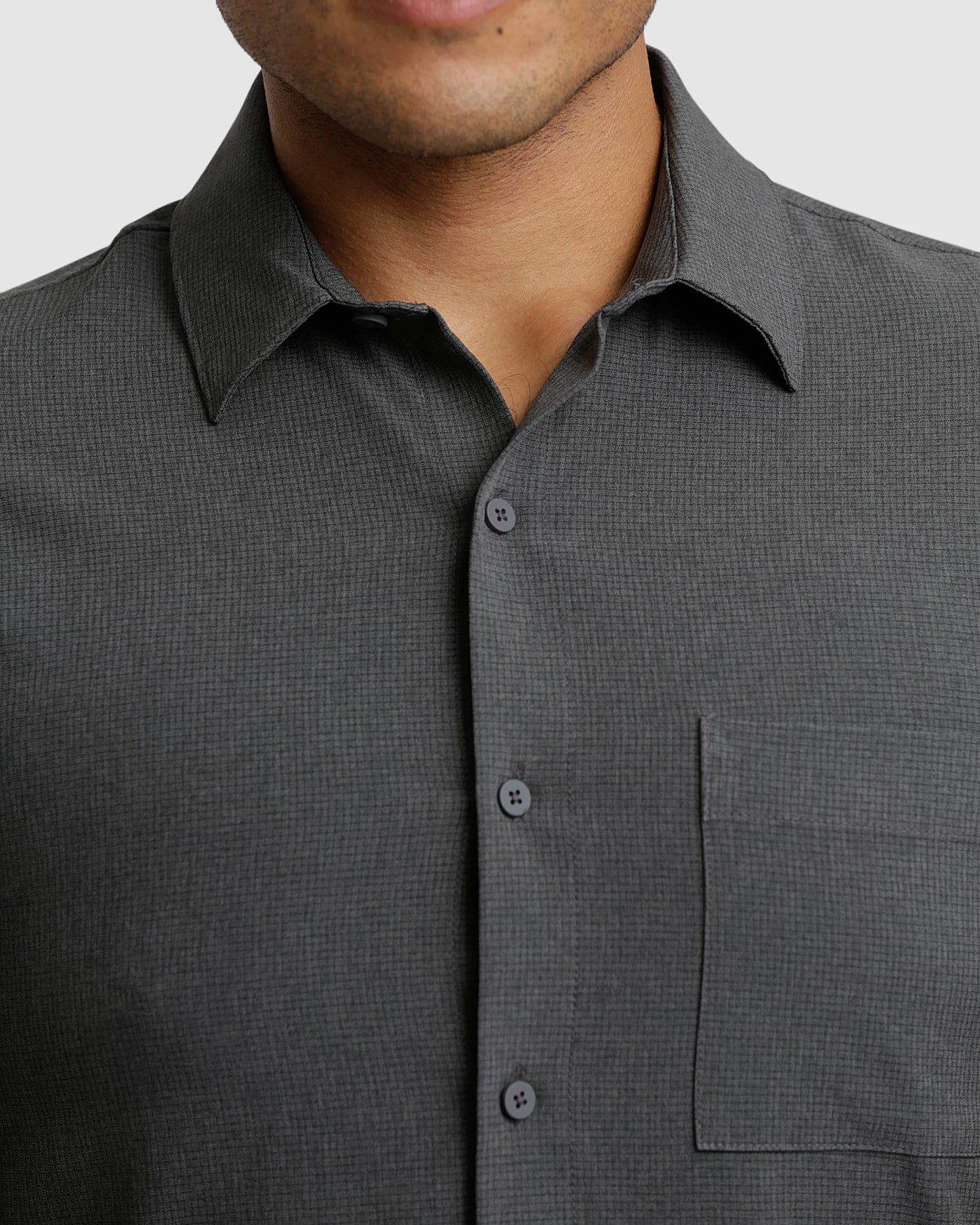 Gray Fiord Short Sleeve Ripstop Commuter Shirt with collar and chest pocket.