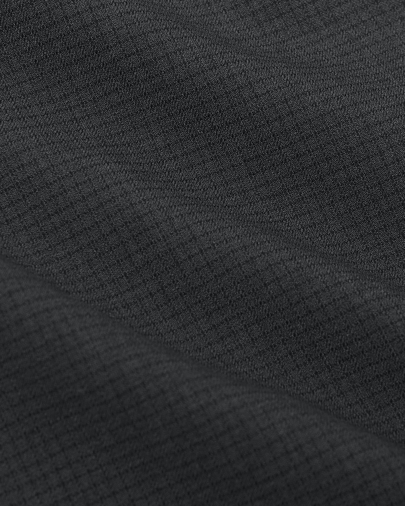 Charcoal Heather Gray Short Sleeve Ripstop Commuter Shirt close-up, highlighting fabric texture.
