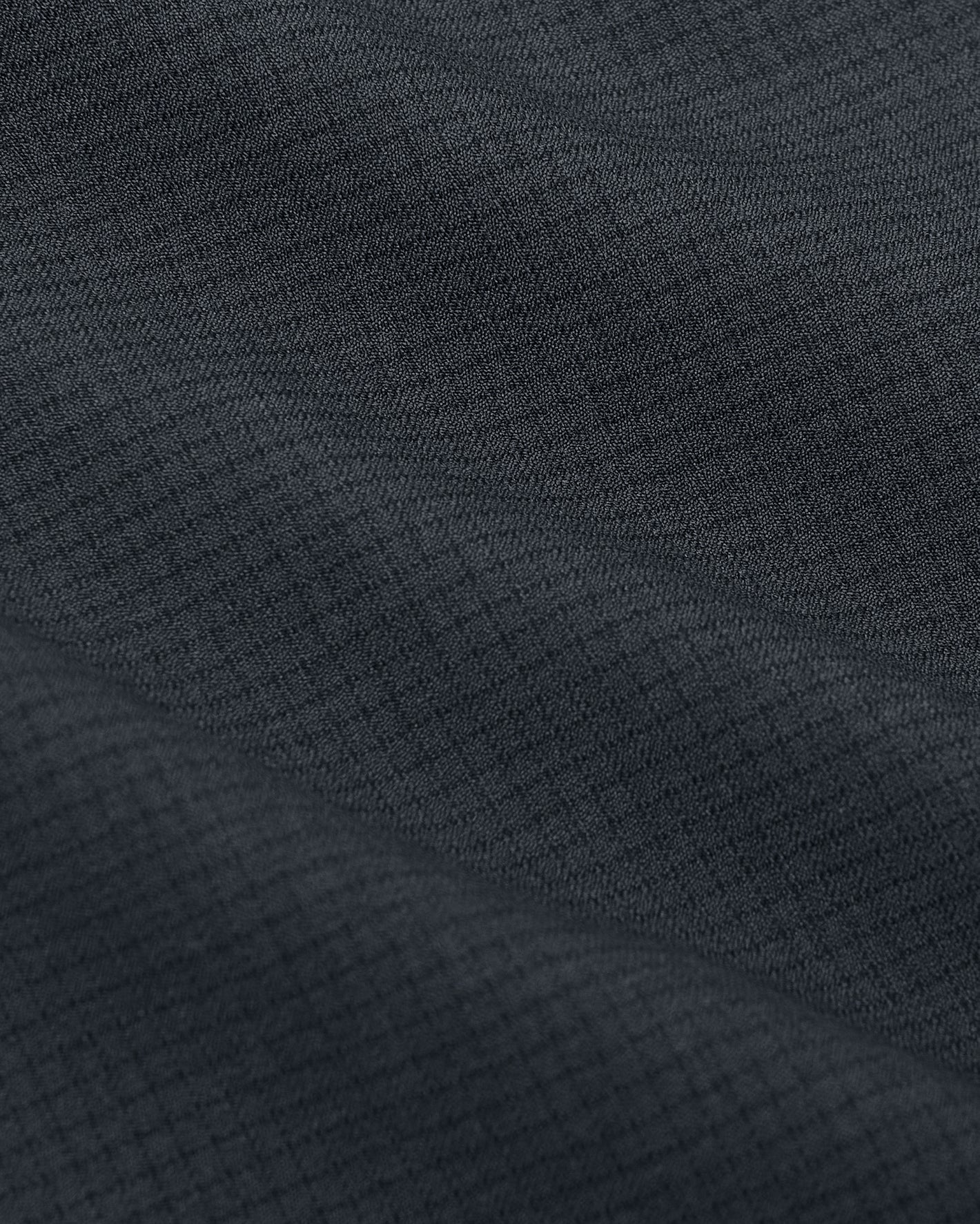 Heather Navy Short Sleeve Ripstop Commuter Shirt 1 showing its grid-like weave.