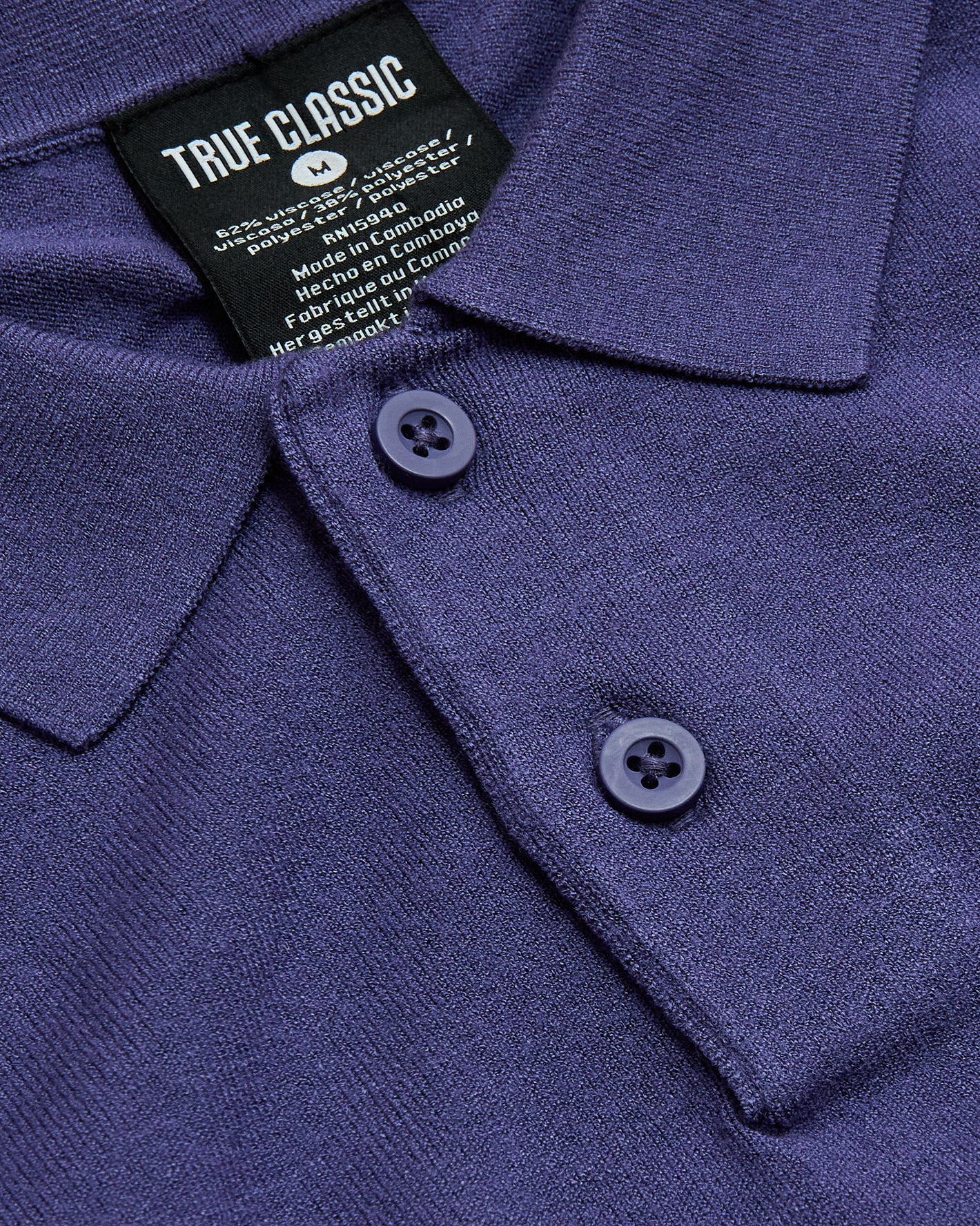 Blueberry Dressy Polo collar with TRUE CLASSIC label and buttons.