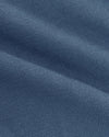 Fiord Dressy Polo's blue knit close-up, showcasing soft, detailed texture.