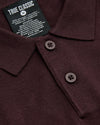 Java Dressy Polo with knitted collar, two-button placket, and “TRUE CLASSIC” label.