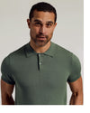 Man wearing Moss Dressy Polo, fitted, short-sleeve, olive-green, direct gaze.