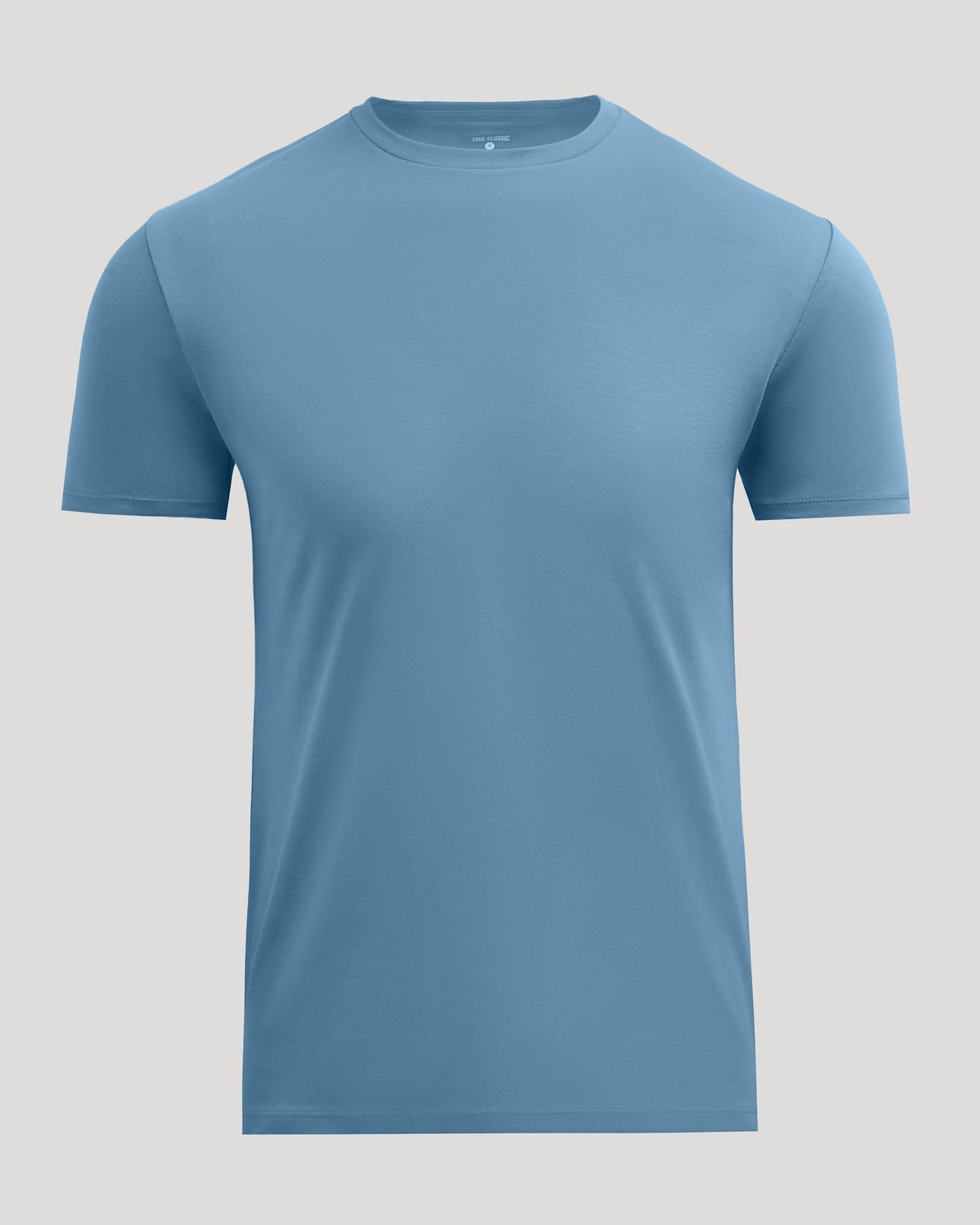 A plain short-sleeve crewneck t-shirt in a muted slate blue color, displayed on a neutral light gray background.