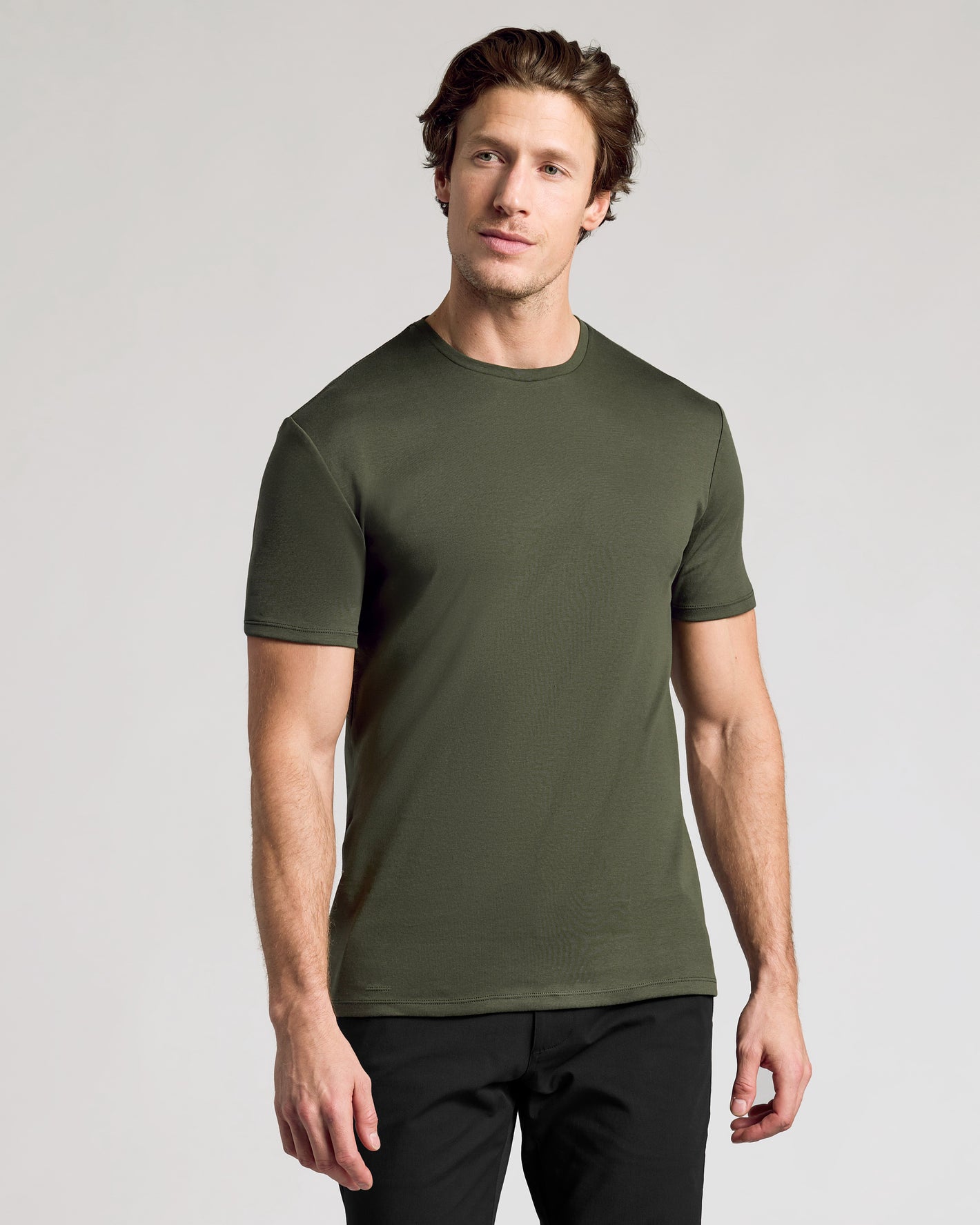 Man wearing Core Premium Pima Crew Neck 4-Pack in olive green.