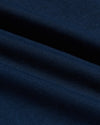 Close-up of soft navy fabric texture showing fine knit detail and subtle folds of the Navy Pima Cotton Blend Crew men's basics garment.