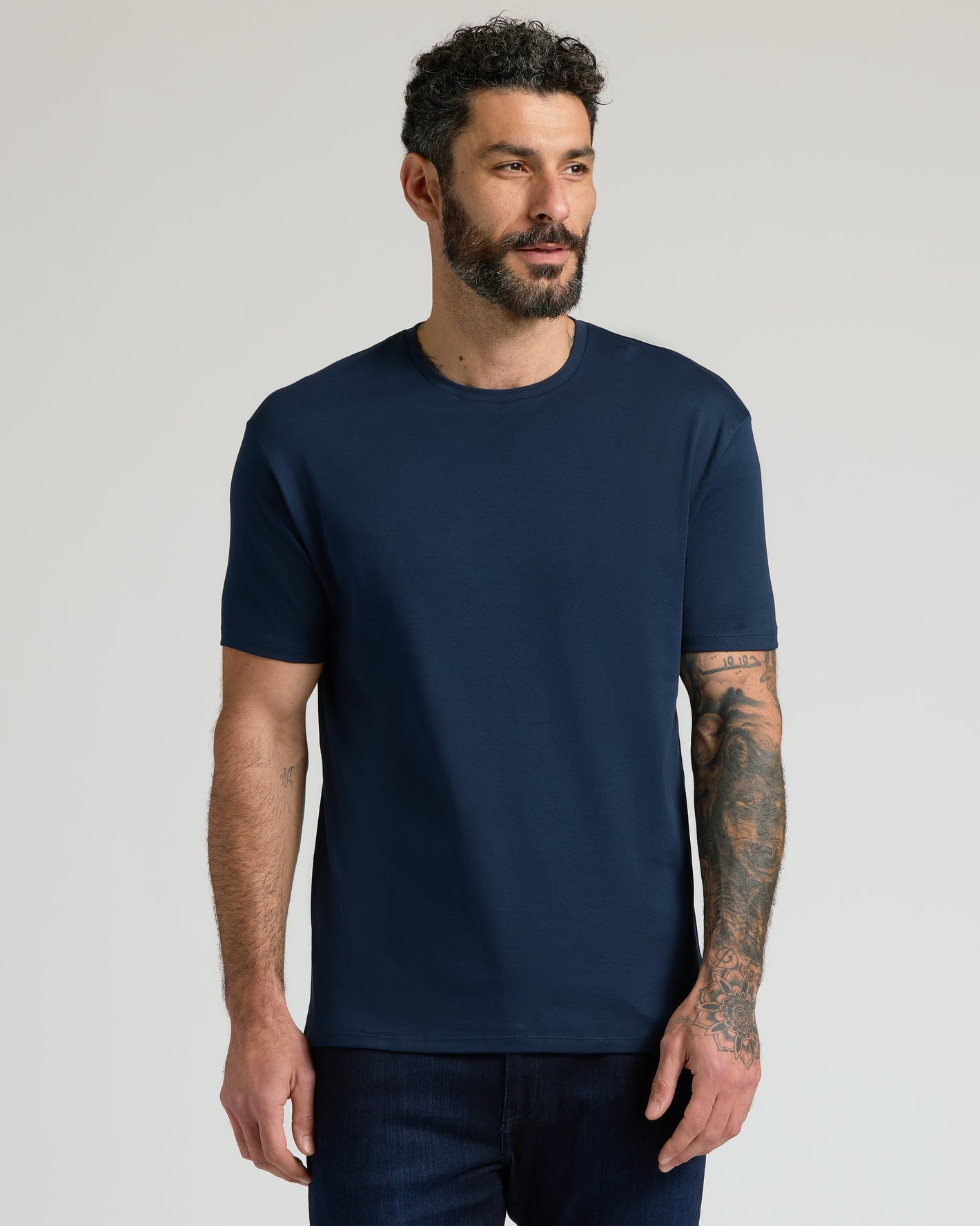 Man wearing Navy & Ether Premium Pima Crew Neck T-shirt.