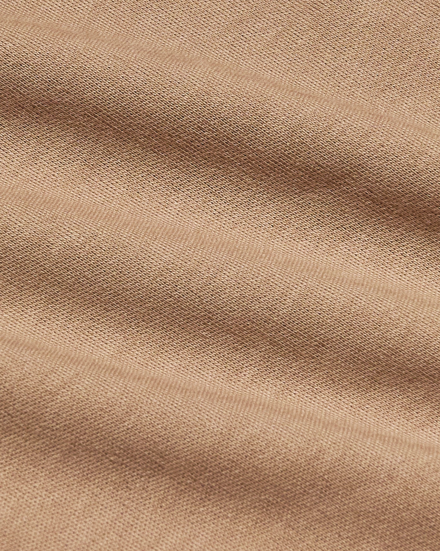 Tahini Premium Pima Crew Neck's fine-knit beige textile close-up.
