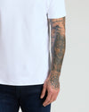 Pima Cotton Blend Crew 4-Pack on person with tattooed arm.