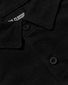 Black Short Sleeve Comfort Knit Shirt with buttons and classic collar.
