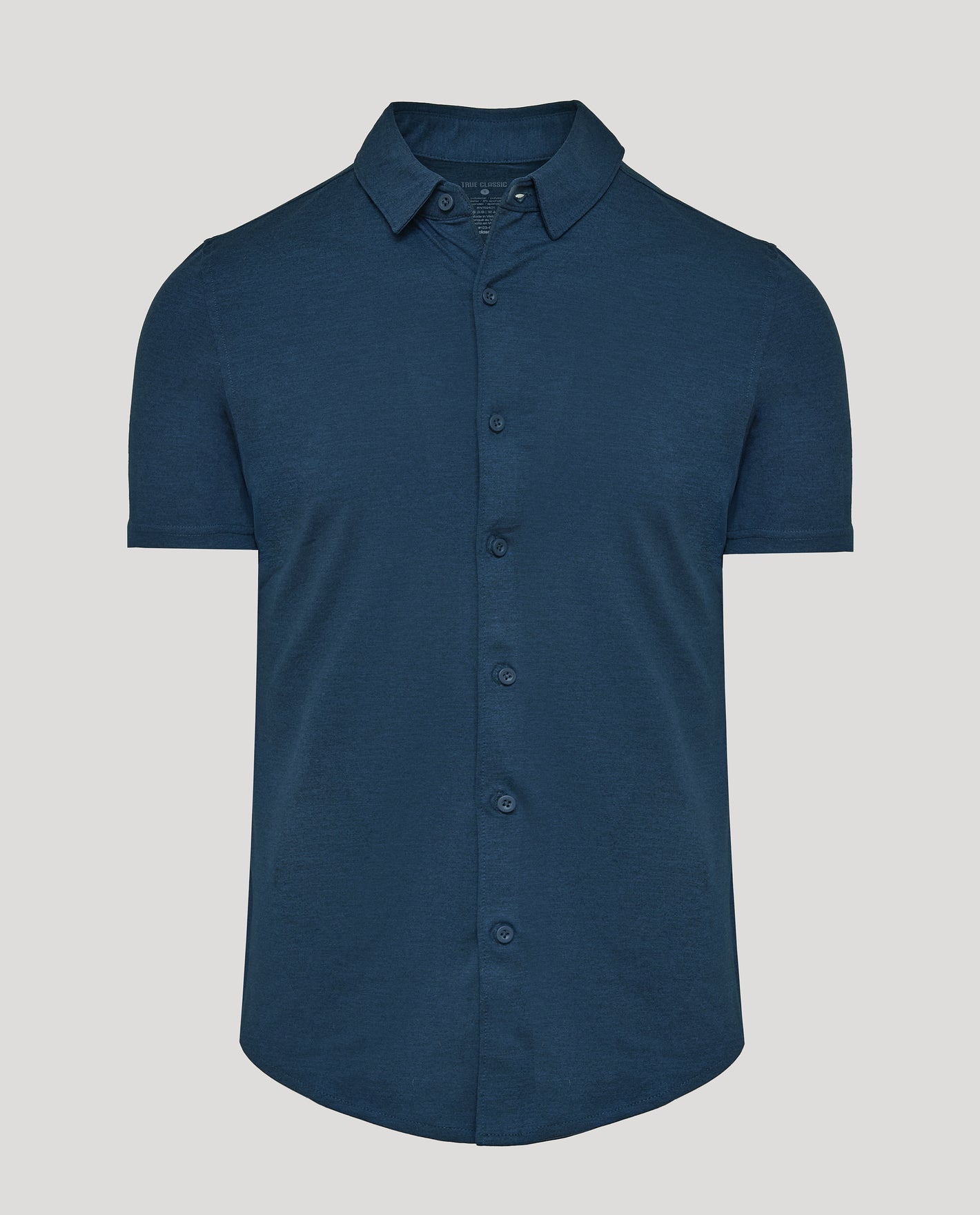 Dark Heather Navy Short Sleeve Comfort Knit Shirt with classic collar and button placket.