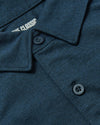 Dark Heather Navy Short Sleeve Comfort Knit Shirt with folded collar and buttons.