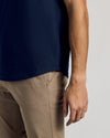 Navy Curved Hem Classic Crew Neck on person with khaki pants.