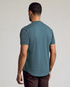 Neptune Curved Hem Classic Crew Neck worn by man from behind.