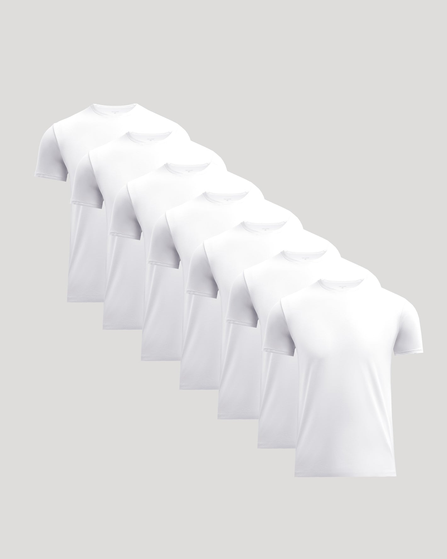 Pima Cotton Blend Crew 7-Pack, staggered plain white T-shirts.